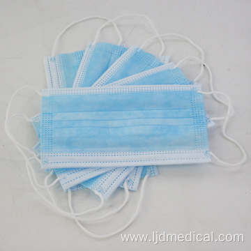 Nonwoven medical surgical mask with earloop